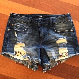 Distressed jean shorts